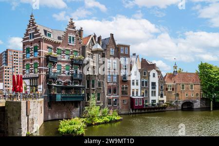 The Aelbrechtskolk is a former lock in the historic district of Delfshaven in Rotterdam, Netherlands, overlooked by the facades of medieval townhouses Stock Photo