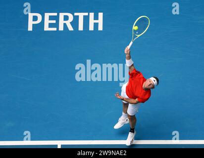 Perth, Australia. 29th Dec, 2023. Alejandro Davidovich Fokina of Spain serves to Thiago Seyboth Wild of Brazil during the men's singles match at the United Cup tennis tournament in Perth, Australia, Dec. 29, 2023. Credit: Zhou Dan/Xinhua/Alamy Live News Stock Photo