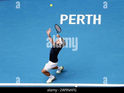 Perth, Australia. 29th Dec, 2023. Thiago Seyboth Wild of Brazil serves to Alejandro Davidovich Fokina of Spain during the men's singles match at the United Cup tennis tournament in Perth, Australia, Dec. 29, 2023. Credit: Zhou Dan/Xinhua/Alamy Live News Stock Photo