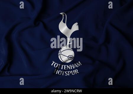 selective focus of Tottenham hotspur logo. North London England football club with flowing fabric texture. 3D illustration Stock Photo