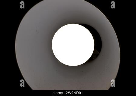 Led lamp light, an electric light that produces light using light-emitting diodes (LEDs). LED lamps are significantly more energy-efficient than equiv Stock Photo