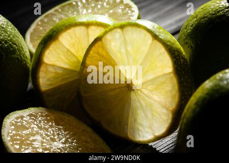 limes closeup on black background Stock Photo
