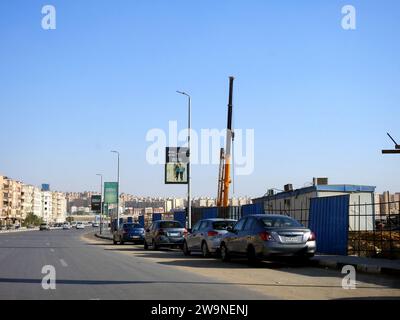 Cairo, Egypt, November 30 2023: A mobile crane at a construction site, real estate and infrastructure developmental projects in Egypt, selective focus Stock Photo