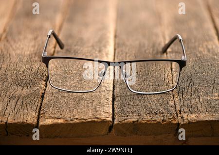 Reading glasses and black hard case isolated on white background. High resolution photo. Stock Photo