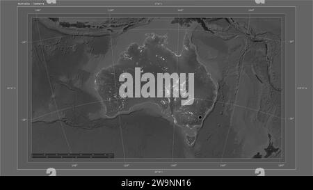 Australia highlighted on a Grayscale elevation map with lakes and rivers map with the country's capital point, cartographic grid, distance scale and m Stock Photo