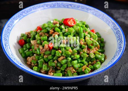 Sautéed（Stir fried）edamame bean,stir fried green soybean with mice pork Stock Photo