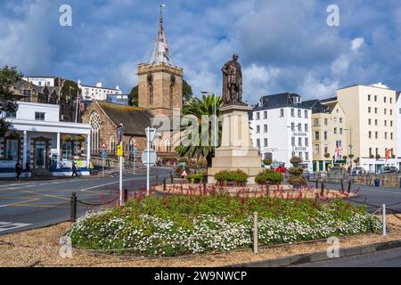 Prince Albert statue, with Town Church in background, from Albert Pier in St Peter Port, Guernsey, Channel Islands Stock Photo