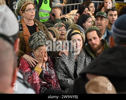 Jerusalem, Israel. 29th Dec, 2023. Family and friends mourn at the funeral of Israeli soldier Captain (reserve) Harel Sharvit, 33, at the Mt. Herzl military cemetery in Jerusalem, on Friday, December 29, 2023. Sharvit, from the Kochav Ya'acov Settlement, was killed in combat in northern Gaza by Palestinian militants. The number of IDF casualties on the ground since the invasion of Gaza after the October 7 Hamas massacre stands at 168. Photo by Debbie Hill/ Credit: UPI/Alamy Live News Stock Photo