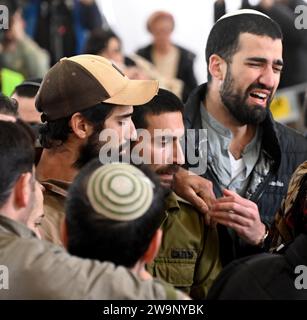 Jerusalem, Israel. 29th Dec, 2023. Family and friends mourn at the funeral of Israeli soldier Captain (reserve) Harel Sharvit, 33, at the Mt. Herzl military cemetery in Jerusalem, on Friday, December 29, 2023. Sharvit, from the Kochav Ya'acov Settlement, was killed in combat in northern Gaza by Palestinian militants. The number of IDF casualties on the ground since the invasion of Gaza after the October 7 Hamas massacre stands at 168. Photo by Debbie Hill/ Credit: UPI/Alamy Live News Stock Photo