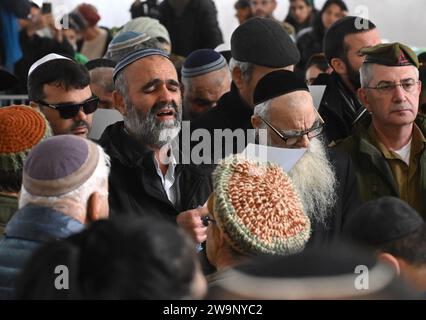 Jerusalem, Israel. 29th Dec, 2023. Family and friends mourn at the funeral of Israeli soldier Captain (reserve) Harel Sharvit, 33, at the Mt. Herzl military cemetery in Jerusalem, on Friday, December 29, 2023. Sharvit, from the Kochav Ya'acov Settlement, was killed in combat in northern Gaza by Palestinian militants. The number of IDF casualties on the ground since the invasion of Gaza after the October 7 Hamas massacre stands at 168. Photo by Debbie Hill/ Credit: UPI/Alamy Live News Stock Photo