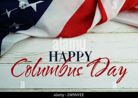 Happy Columbus Day text messege  with USA flag on wooden background Stock Photo