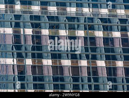 Revlon Building Highly reflective multi-hued glass envelops 625 Madison Avenue ...