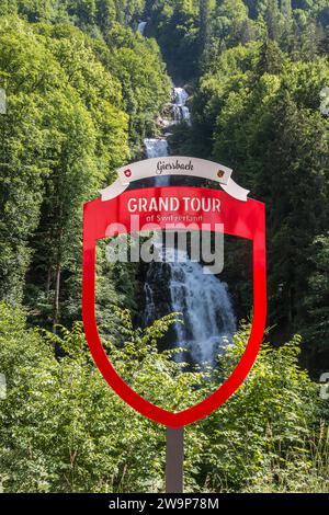 Giessbach, Switzerland - 18 June 2022: Giessbach cascade waterfalls in red frame of Swiss Grand Tour. It is one of the 60 photo spots that the Swiss T Stock Photo