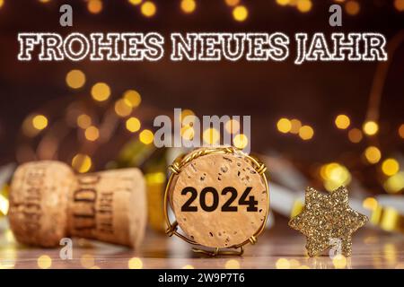 December 29, 2023: Happy New Year 2024 concept, fireworks lettering Happy New Year and a champagne cork with the year 2024 PHOTOMONTAGE *** Frohes neues Jahr 2024 Konzept, Feuerwerk Schriftzug Frohes neues Jahr und ein Sektkorken mit der Jahreszahl 2024 FOTOMONTAGE Stock Photo