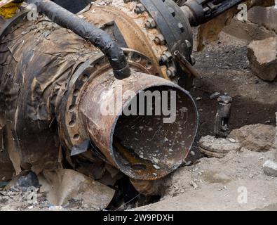 Cut pipe of the old heating main during repair work Stock Photo