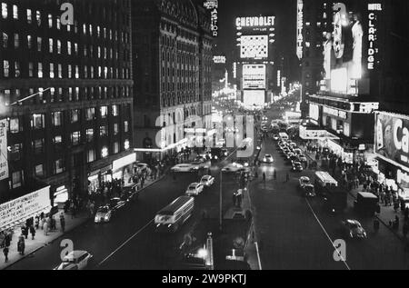 Times Square at night, New York City, New York, USA, Angelo Rizzuto, Anthony Angel Collection, November 1953 Stock Photo