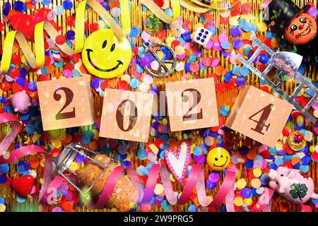 The Year 2024 With Smiley Surrounded By Garlands And Good Luck Charms   Numerical Dice Form The Year 2024 Surrounded By Confetti And Good Luck Charms Symbol Photo New Year 2024 Photomontage 2w9prg5 