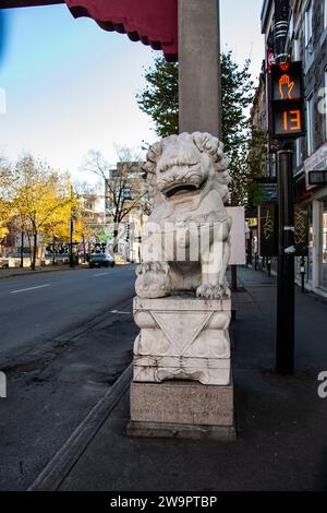 Lion sculpture at the Chinatown gate on St. Laurent in Montreal, Quebec, Canada Stock Photo