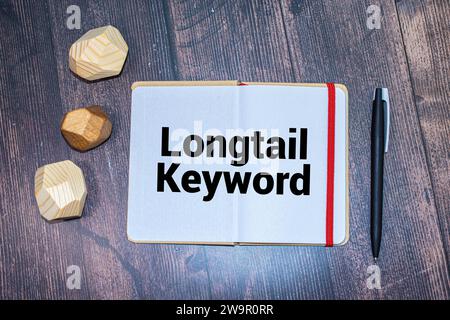 Business concept about Longtail Keyword with sign on the piece of paper. Stock Photo