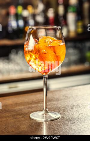 Aperol Spritz cocktail drink on the bar counter ready for the guest. Stock Photo