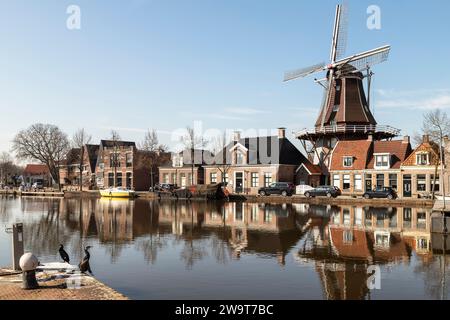 Windmill - De Vlijt, along the harbor in the center of the Dutch city of Meppel. Stock Photo