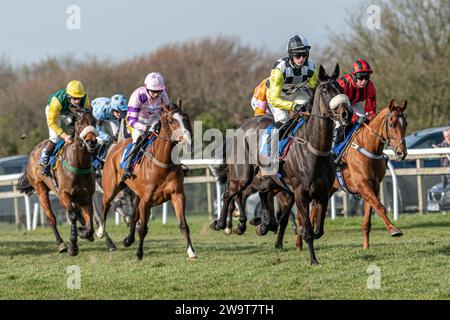 Photos of Petrossian, ridden by Harry Cobden and trained by Paul Nicholls, running over hurdles at Wincanton, March 21st 2022 Stock Photo