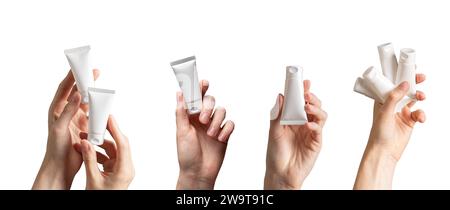 Hand holding cream tubes, beauty product packages mockups, cosmetic packs isolated on white, set Stock Photo