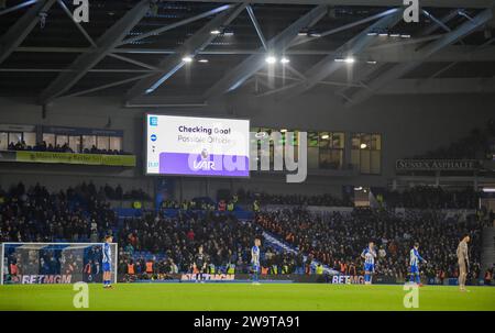 A VAR check during the Premier League match between Brighton and Hove Albion and Tottenham Hotspur at the American Express Stadium  , Brighton , UK - 28th December 2023 Photo Simon Dack / Telephoto Images  Editorial use only. No merchandising. For Football images FA and Premier League restrictions apply inc. no internet/mobile usage without FAPL license - for details contact Football Dataco Stock Photo