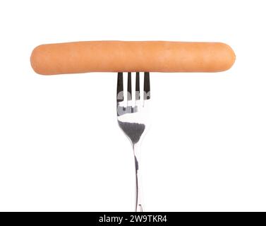 fork with tasty cooked sausage on white background, meat product Stock Photo