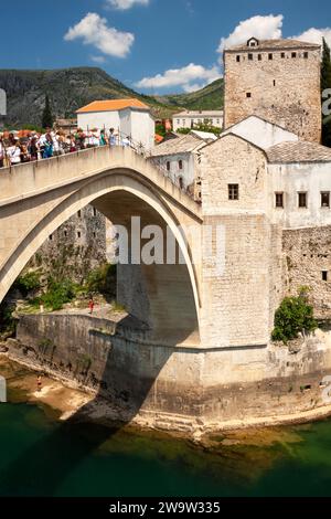 Stari Most or Mostar bridge above the Neretva river and the old town in Mostar in Bosnia and Herzegovina in Eastern Europe Stock Photo