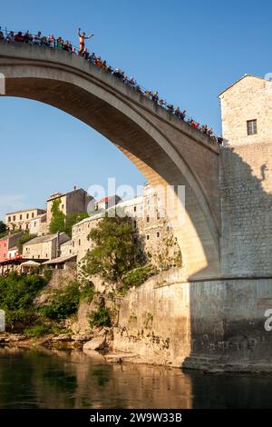 Stari Most or Mostar bridge above the Neretva river and the old town in Mostar in Bosnia and Herzegovina in Eastern Europe Stock Photo