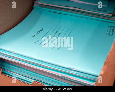 Stack of new school notebooks on store shelf Stock Photo