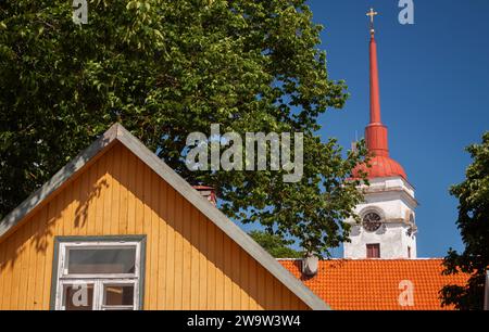 Colourful buildings and church spire in Kuresaare town on Saaremaa island in the Baltic sea off the coast of Estonia in Eastern Europe Stock Photo