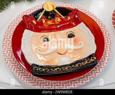 Voronezh - Russia, December 25, 2022: Souvenir plate with the image of Santa Claus Stock Photo