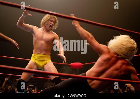 The Iron Claw (2023) directed by Sean Durkin and starring Zac Efron, Jeremy Allen White and Harris Dickinson. The true story of the inseparable Von Erich brothers, who made history in the intensely competitive world of professional wrestling in the early 1980s. Publicity photograph ***EDITORIAL USE ONLY***. Credit: BFA / A24 Stock Photo