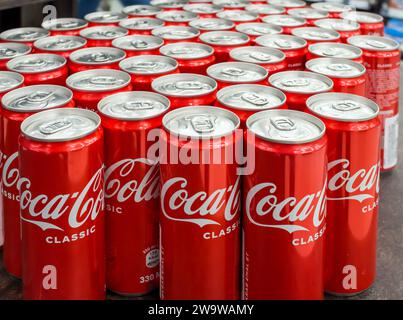 Voronezh - Russia, December 25, 2022: Aluminum cans of Coca Cola Stock Photo