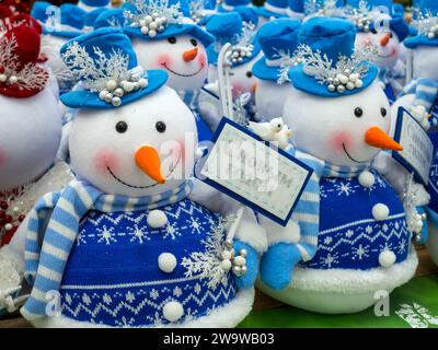 Voronezh - Russia, December 25, 2022: Soft toys snowmen with signs Stock Photo