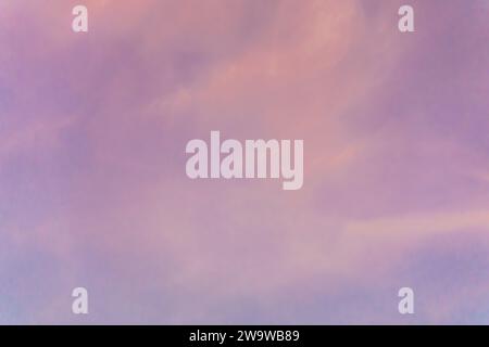 Beautiful Blue Orange Pink Afternoon Sky sweet sky Abstract pink sunset sky and ocean nature background with blurred panning motion. Stock Photo