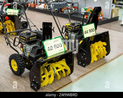 Voronezh - Russia, December 25, 2022: Manual Snow Throwers for Sale Stock Photo