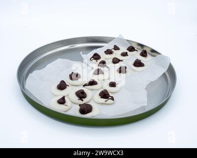 From the smooth chill of the mint center to the rich, melt-in-your-mouth chocolate, this close-up promises a symphony of homemade flavors. Every imper Stock Photo
