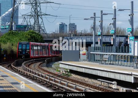 Royal Victoria, London, UK - April 14th 2013: DLR train arrives at the Royal Victoria Docklands Light Railway station. Stock Photo