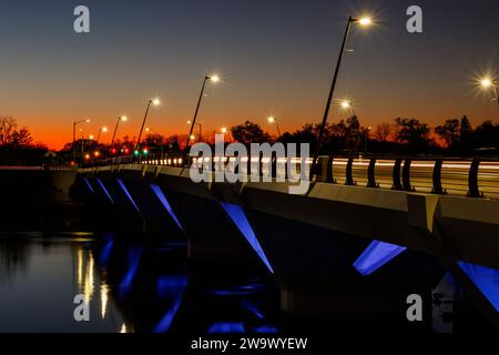Car light trails at dusk. Stewart Street Bridge, Dayton, Ohio, USA. Stock Photo