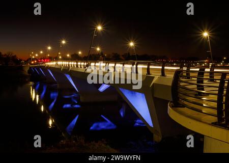 Car light trails at dusk. Stewart Street Bridge, Dayton, Ohio, USA. Stock Photo