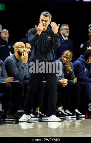 South Bend, Indiana, USA. 30th Dec, 2023. Virginia head coach Tony Bennett encourages his team during NCAA basketball game action between the Virginia Cavaliers and the Notre Dame Fighting Irish at Purcell Pavilion at the Joyce Center in South Bend, Indiana. Notre Dame defeated Virginia 76-54. John Mersits/CSM/Alamy Live News Stock Photo