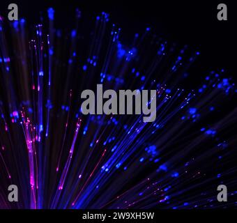 colourful abstract background of fiber optic cables Stock Photo