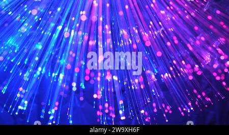 colourful abstract background of fiber optic cables Stock Photo