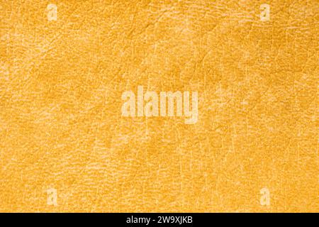 Yellow artificial leather texture background. Stock Photo