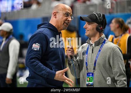 Atlanta, United States. 30th Dec, 2023. Penn State head coach James Franklin gives a quick interview view before halftime during the Peach Bowl NCAA college football game against Mississippi on Saturday, Dec. 30, 2023, in Atlanta, Ga. Photo by David Tulis/UPI Credit: UPI/Alamy Live News Stock Photo