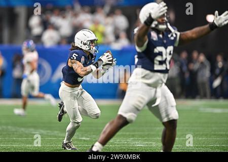 Atlanta, United States. 30th Dec, 2023. Penn State cornerback Cam Miller (5) makes an interception against Mississippi during the first half of the Peach Bowl on Saturday, Dec. 30, 2023, in Atlanta, Ga. Photo by David Tulis/UPI Credit: UPI/Alamy Live News Stock Photo