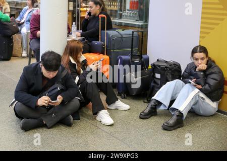 London, UK. 31st Dec, 2023. Stranded passengers are pictured at St Pancras International Station in London, Britain on Dec. 30, 2023. Eurostar trains to and from London have been cancelled on Saturday after a tunnel under River Thames was flooded, stranding thousands of passengers ahead of New Year's Eve. Credit: Xinhua/Alamy Live News Stock Photo